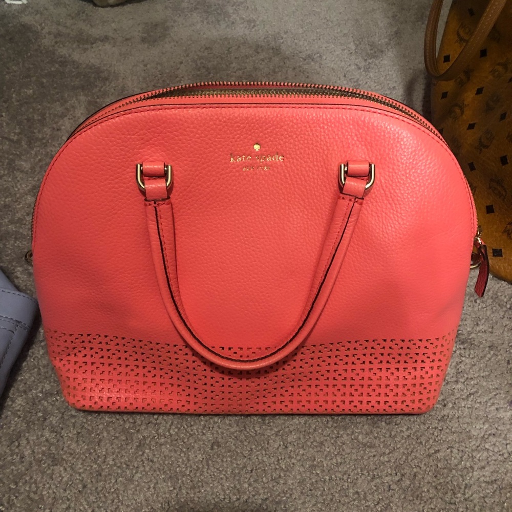 Gently used hot pink Kate Spade bag. Handle to hold as a tote w/ crossbody strap